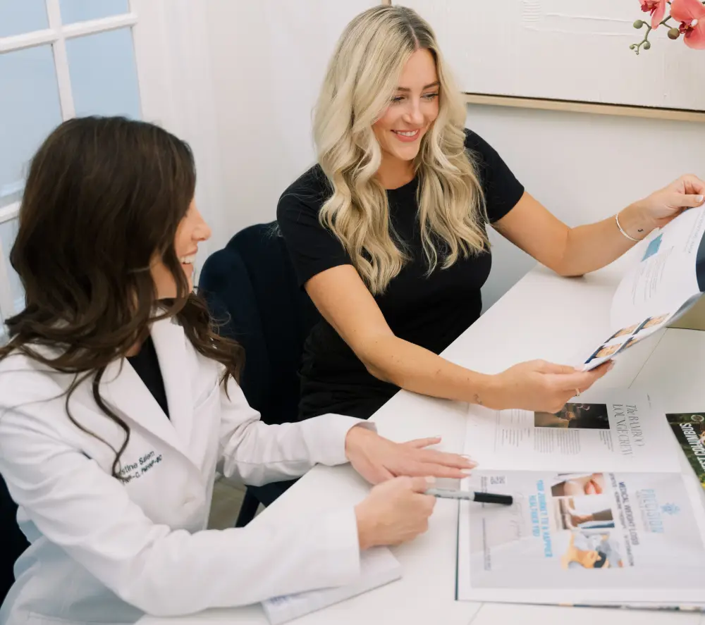 Precision Health and Wellness doctor consulting with a patient about personalized treatment options.