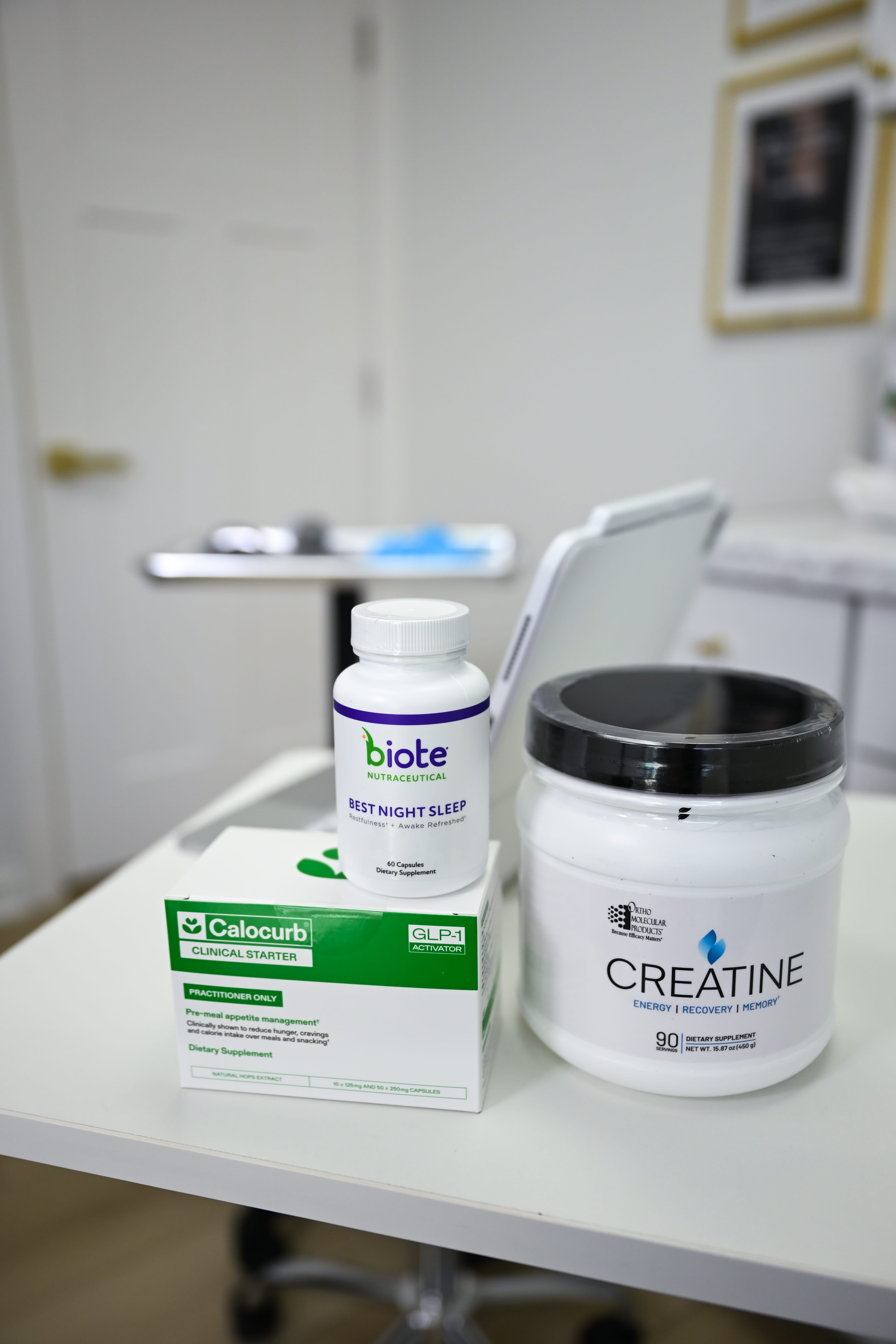 A patient sits across from a healthcare provider during a BioTE pellet therapy consultation